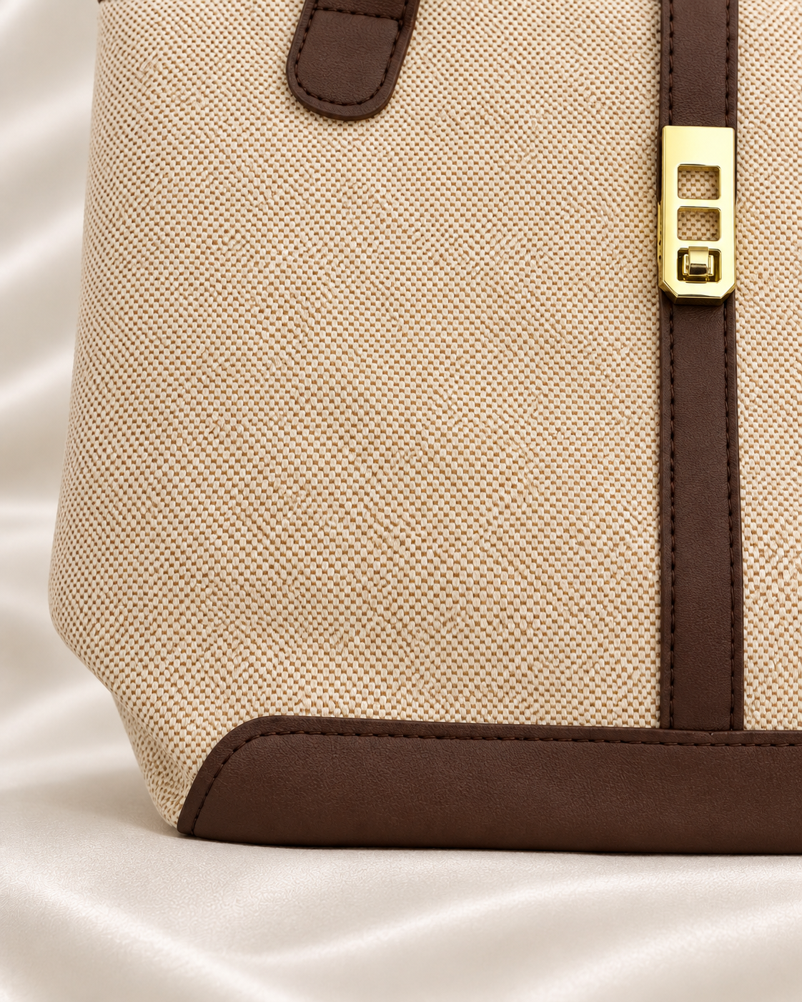 Base trim and woven body detail of beige and brown tote bag