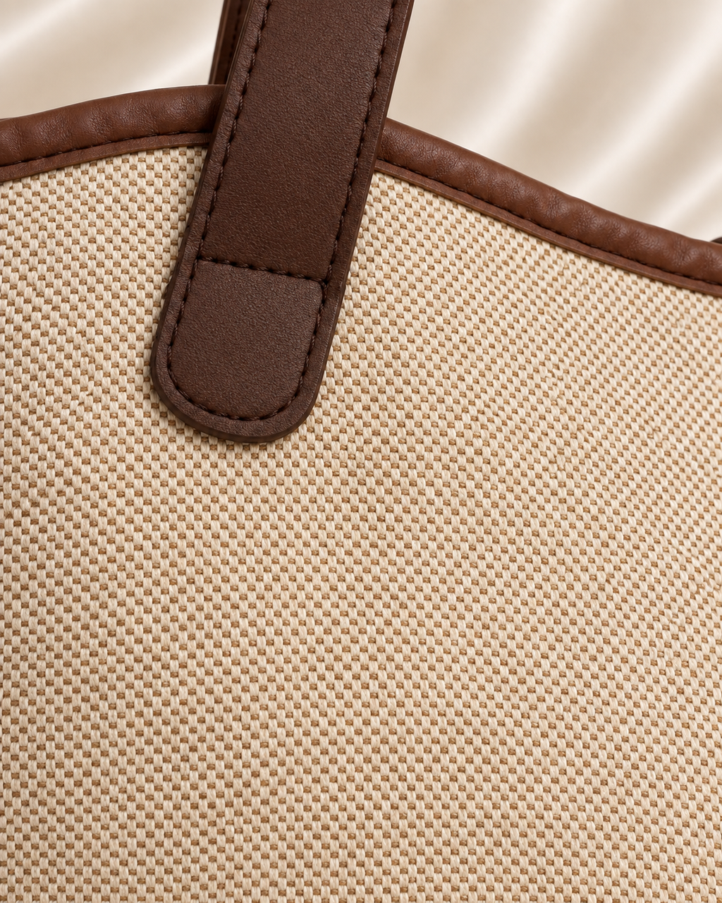 Woven fabric texture detail of beige and brown tote bag
