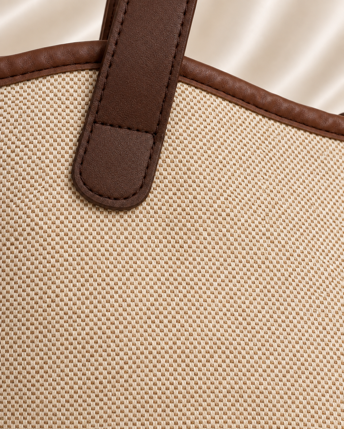 Woven fabric texture detail of beige and brown tote bag