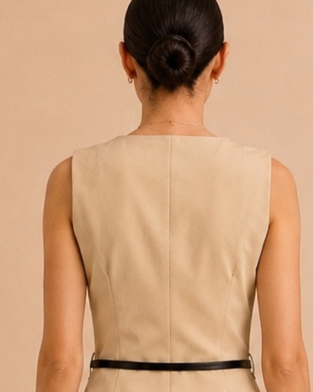 Beige tailored set back neckline and armhole detail
