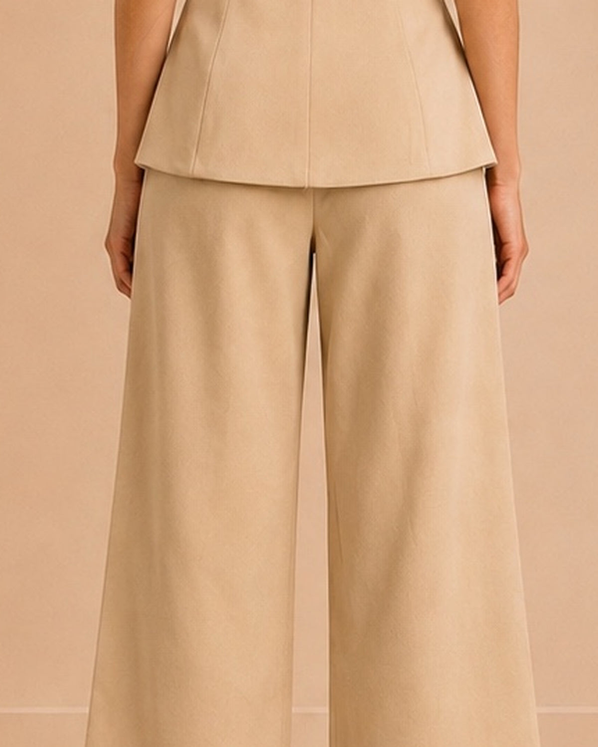 Beige tailored set back trouser upper center seam detail