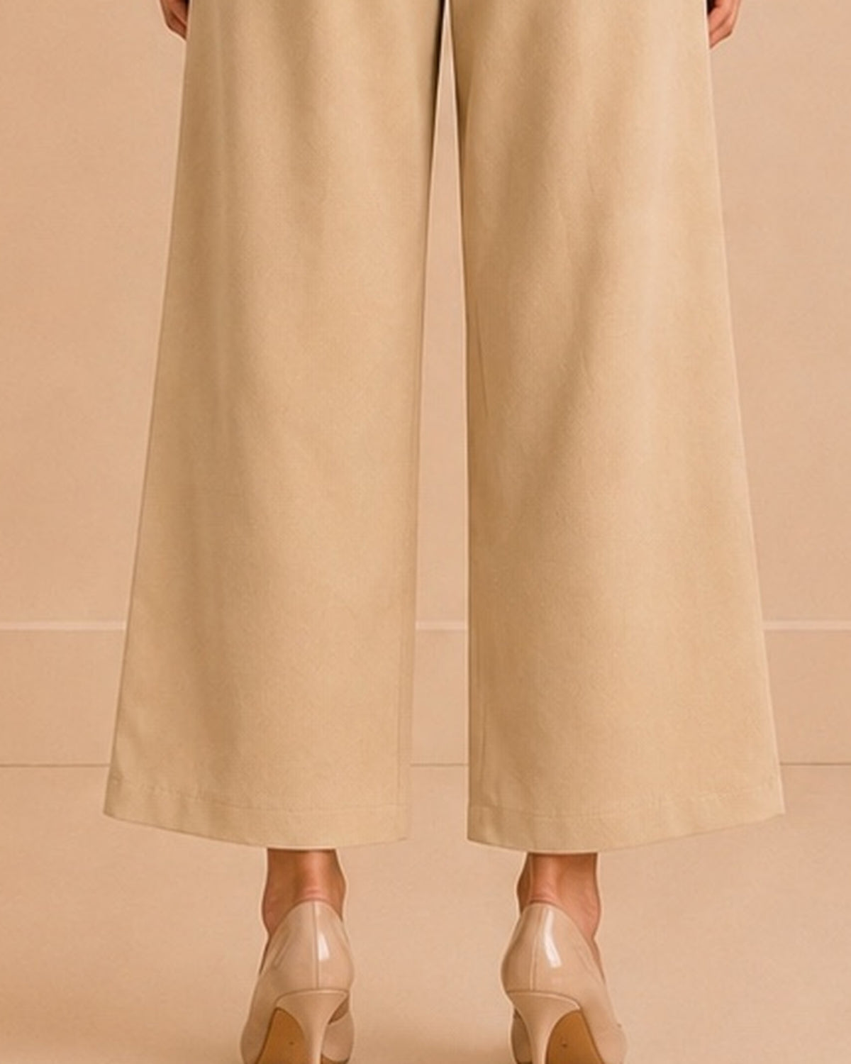 Beige tailored set back wide-leg trouser and hem detail