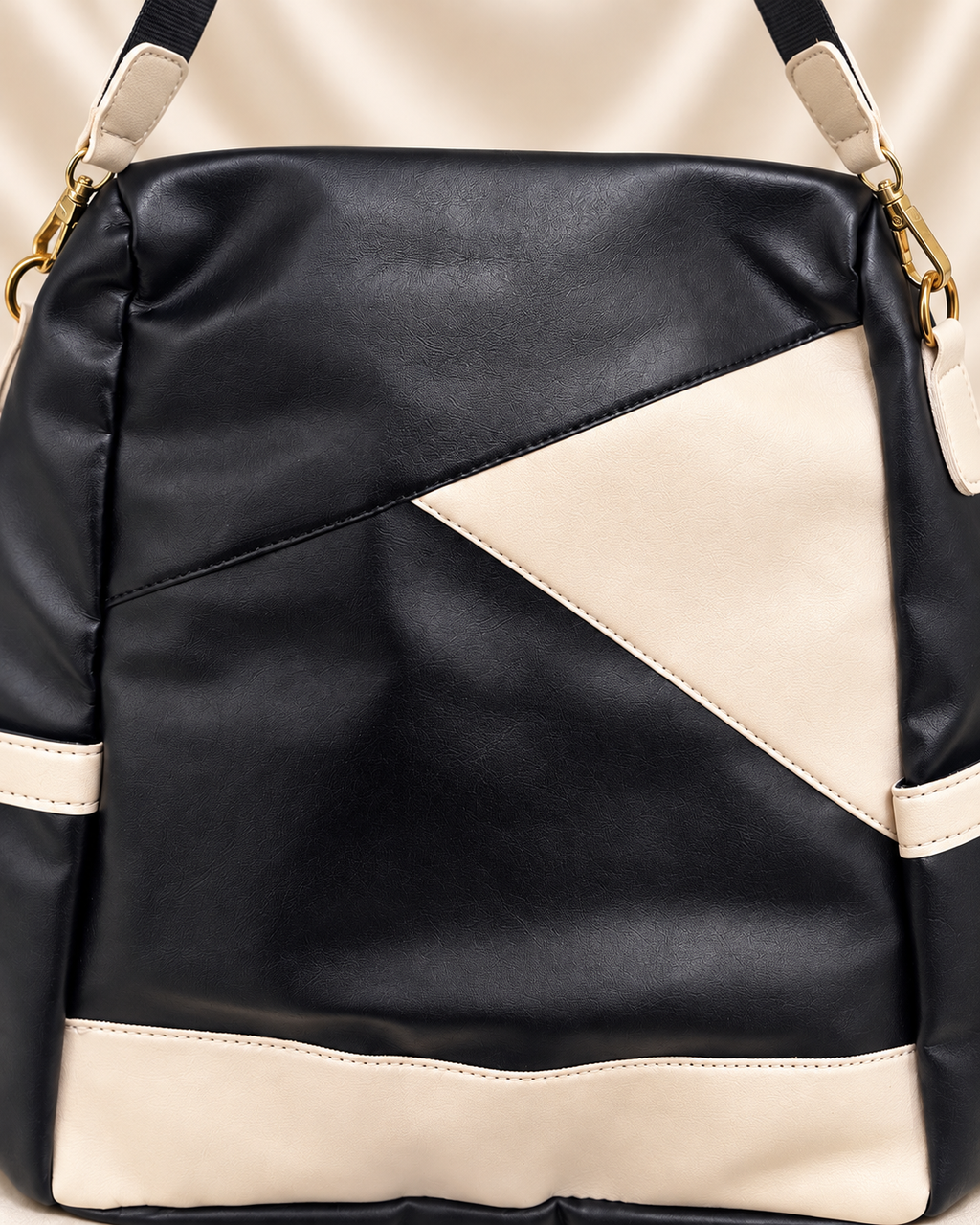 Black and cream bag geometric front panel detail