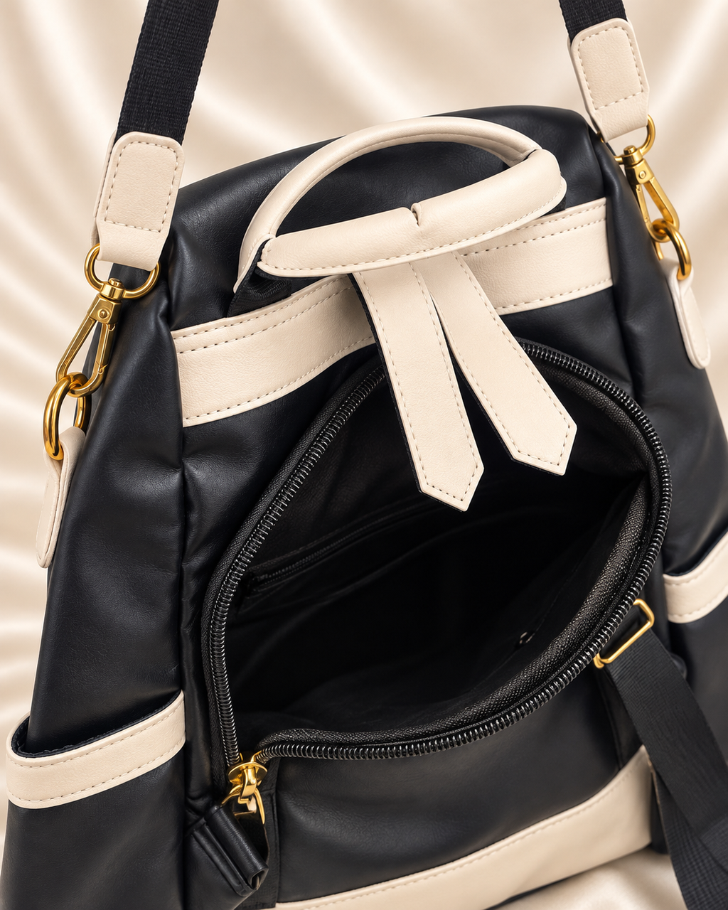 Black and cream bag open zipper and interior compartment detail