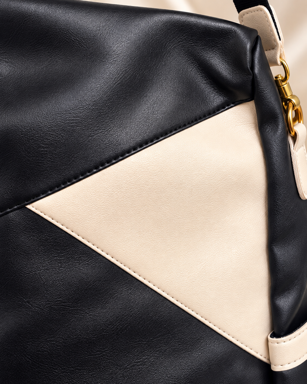 Black and cream bag stitching and material detail