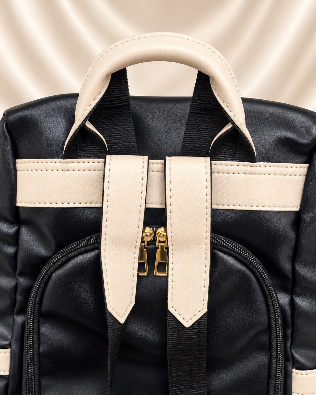 Black and cream bag top handle and strap detail