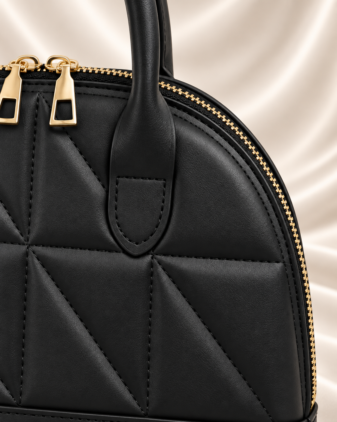 Black geometric handbag - curved side and zipper detail