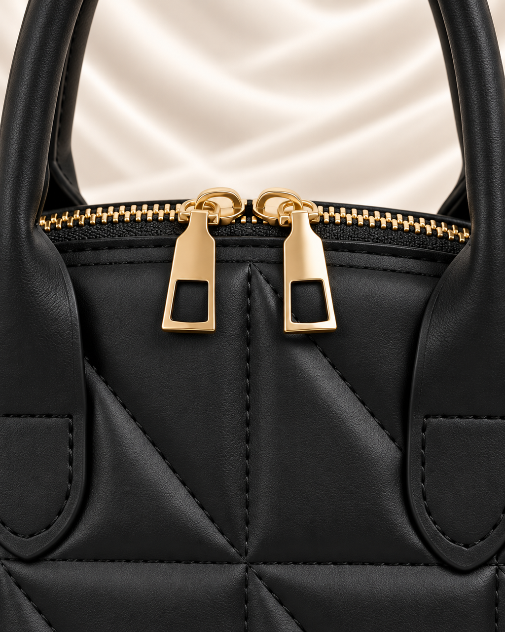 Black geometric handbag - dual gold zipper detail