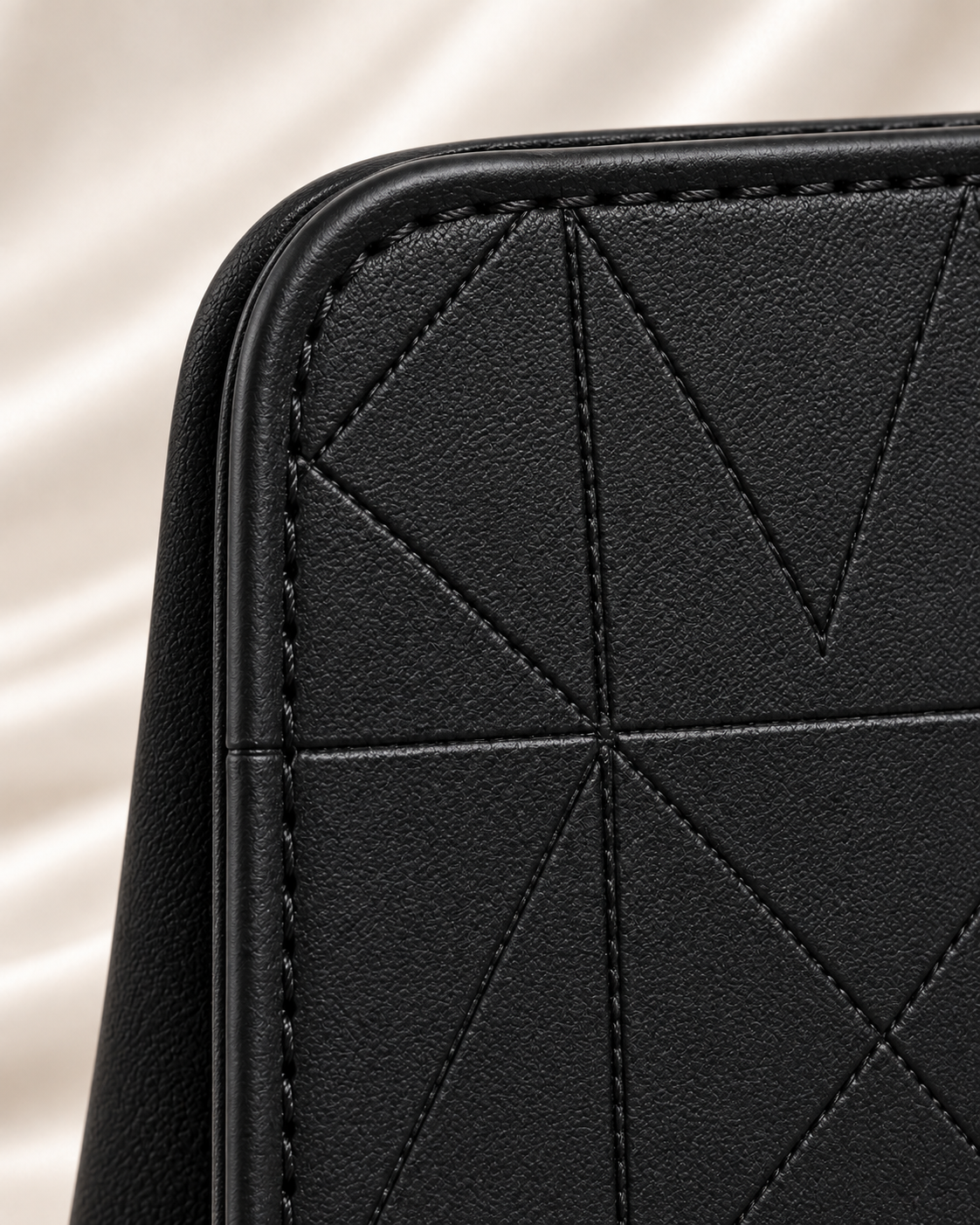 Edge piping and stitching detail