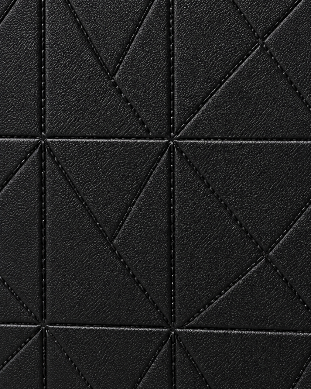 Black geometric texture and stitching detail