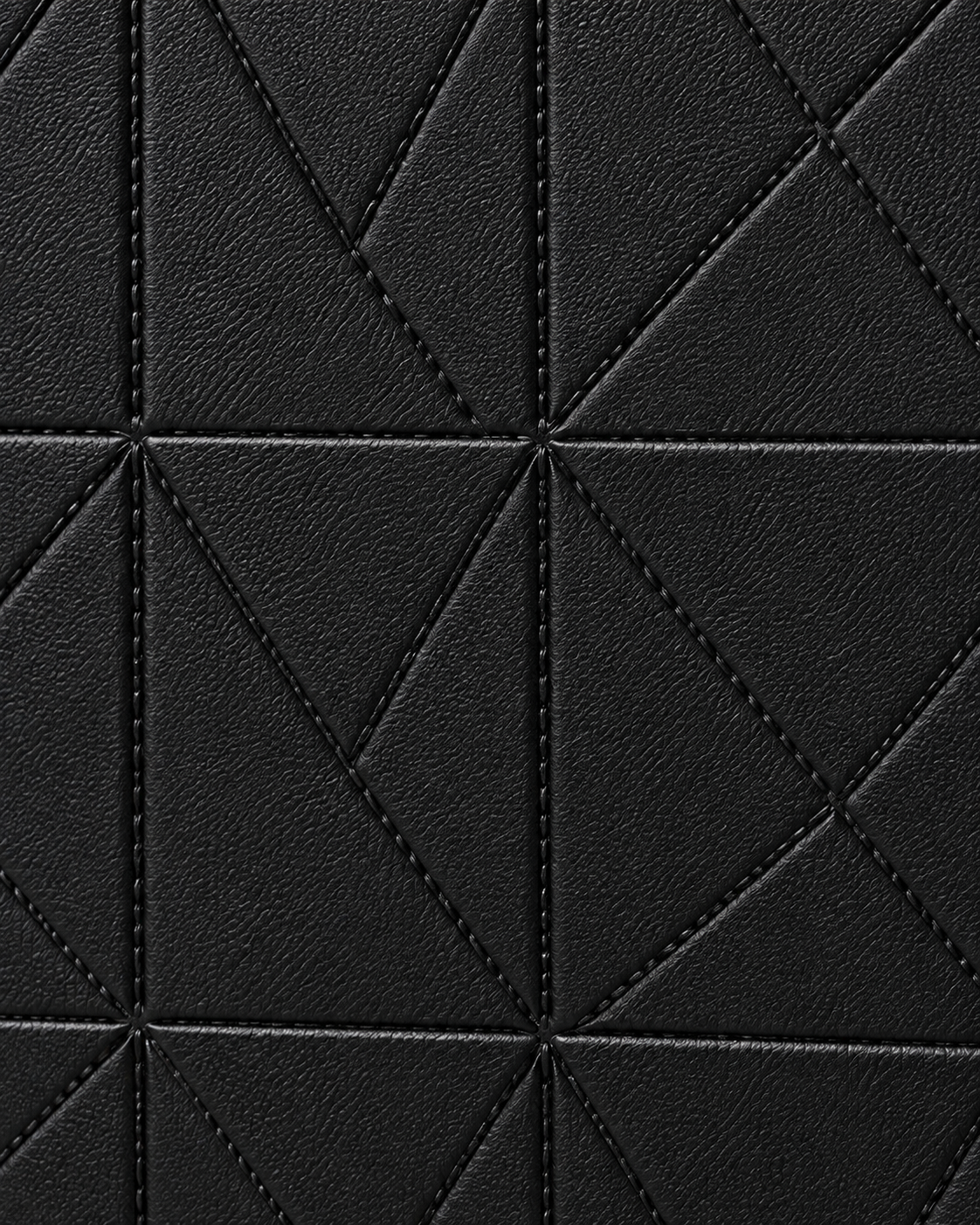 Black geometric texture and stitching detail