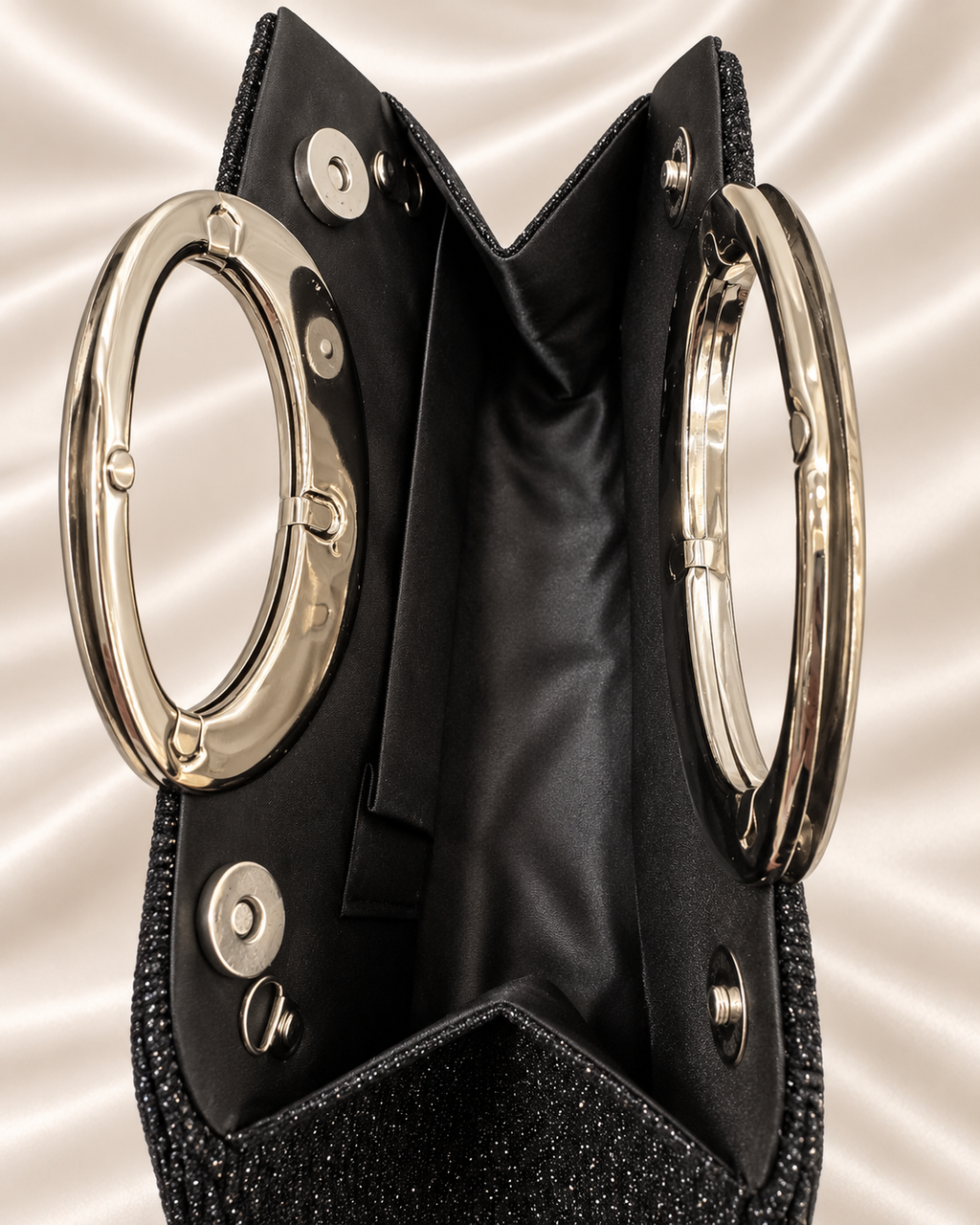 Close-up of black interior lining and magnetic closure