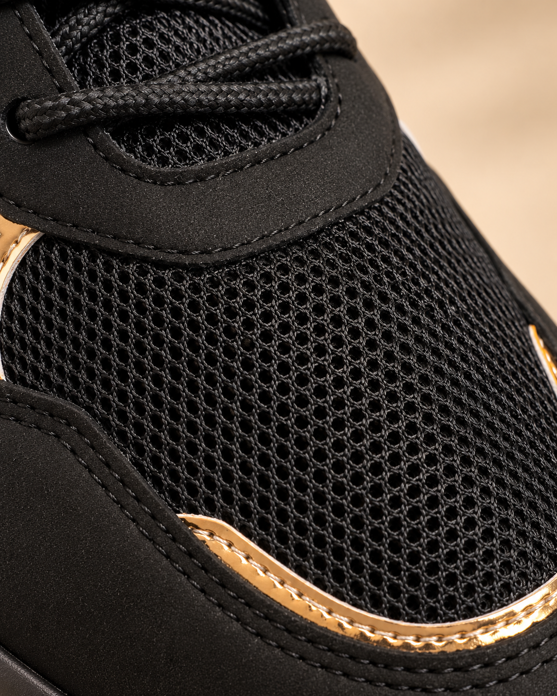 Black and gold sneakers - mesh texture detail