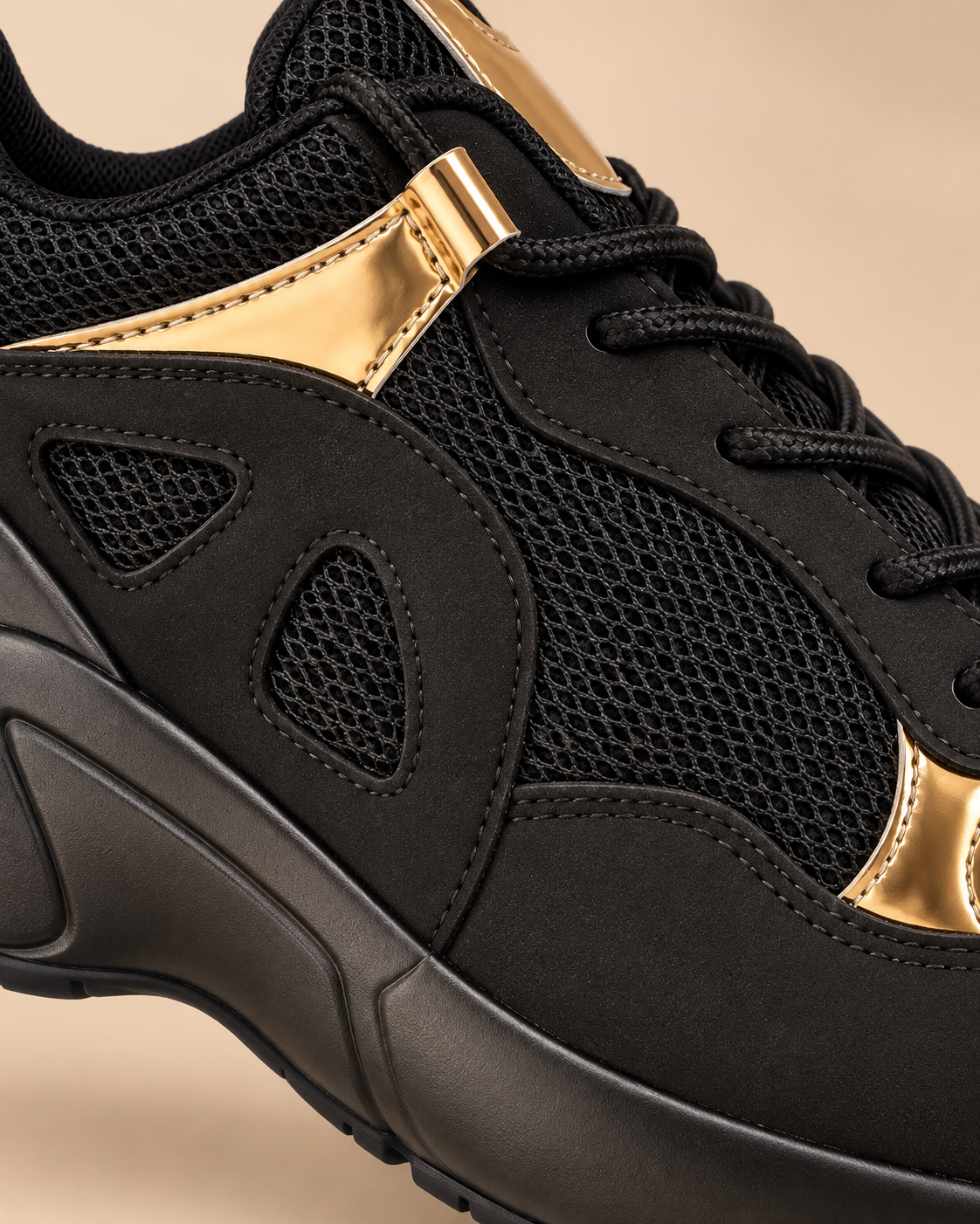 Black and gold sneakers - side panel detail