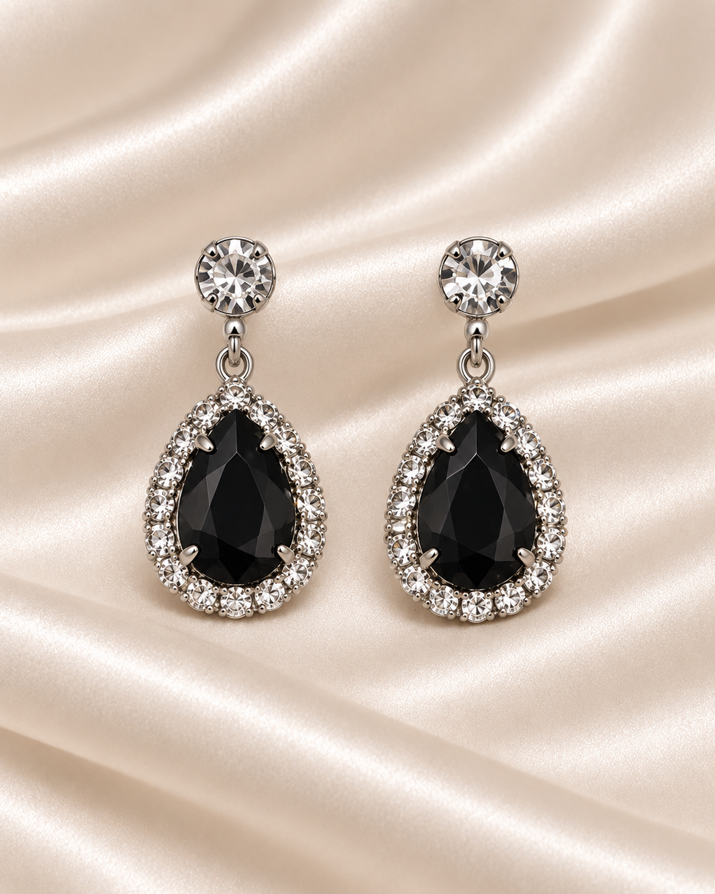 Black teardrop earrings detail