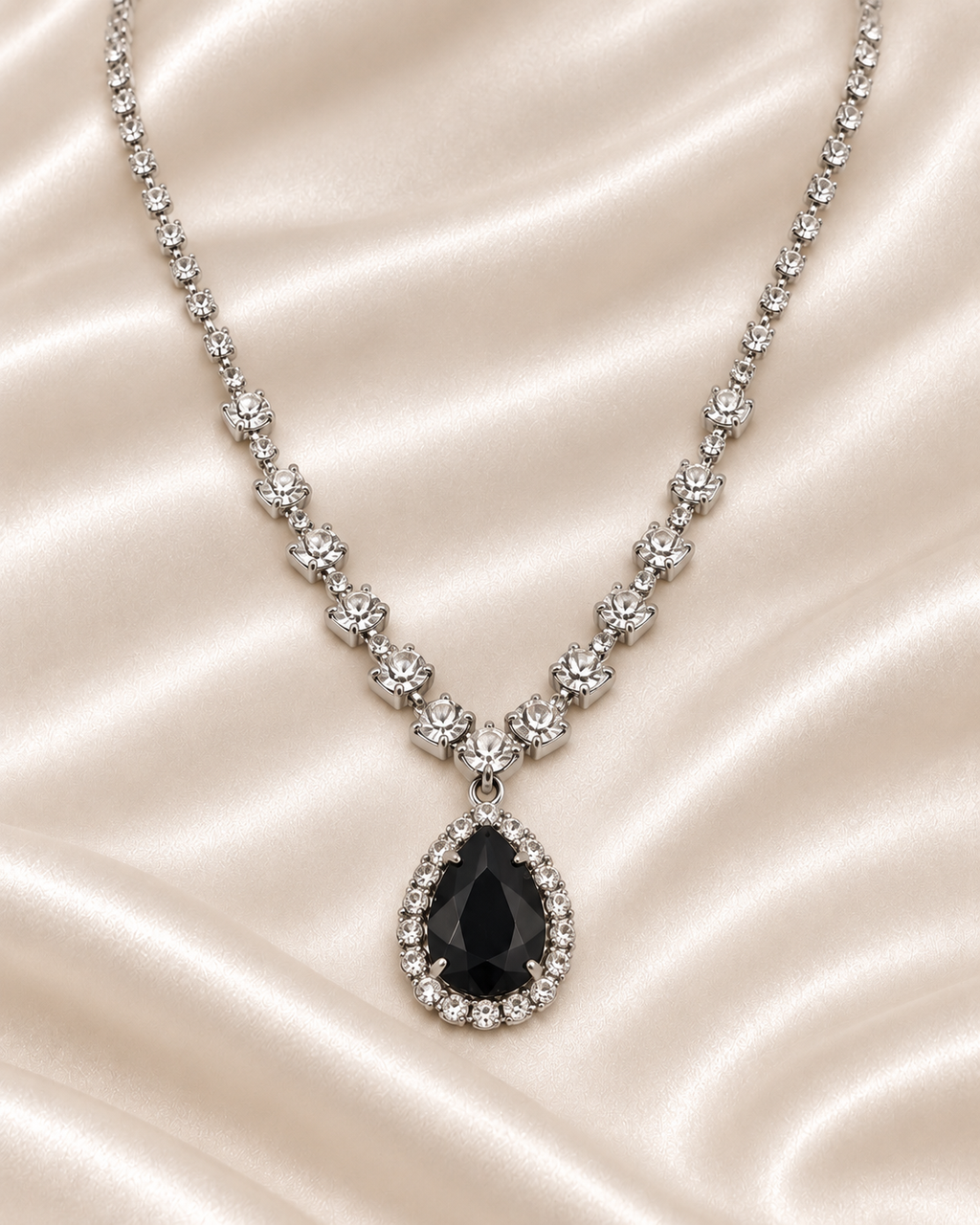 Black teardrop necklace detail