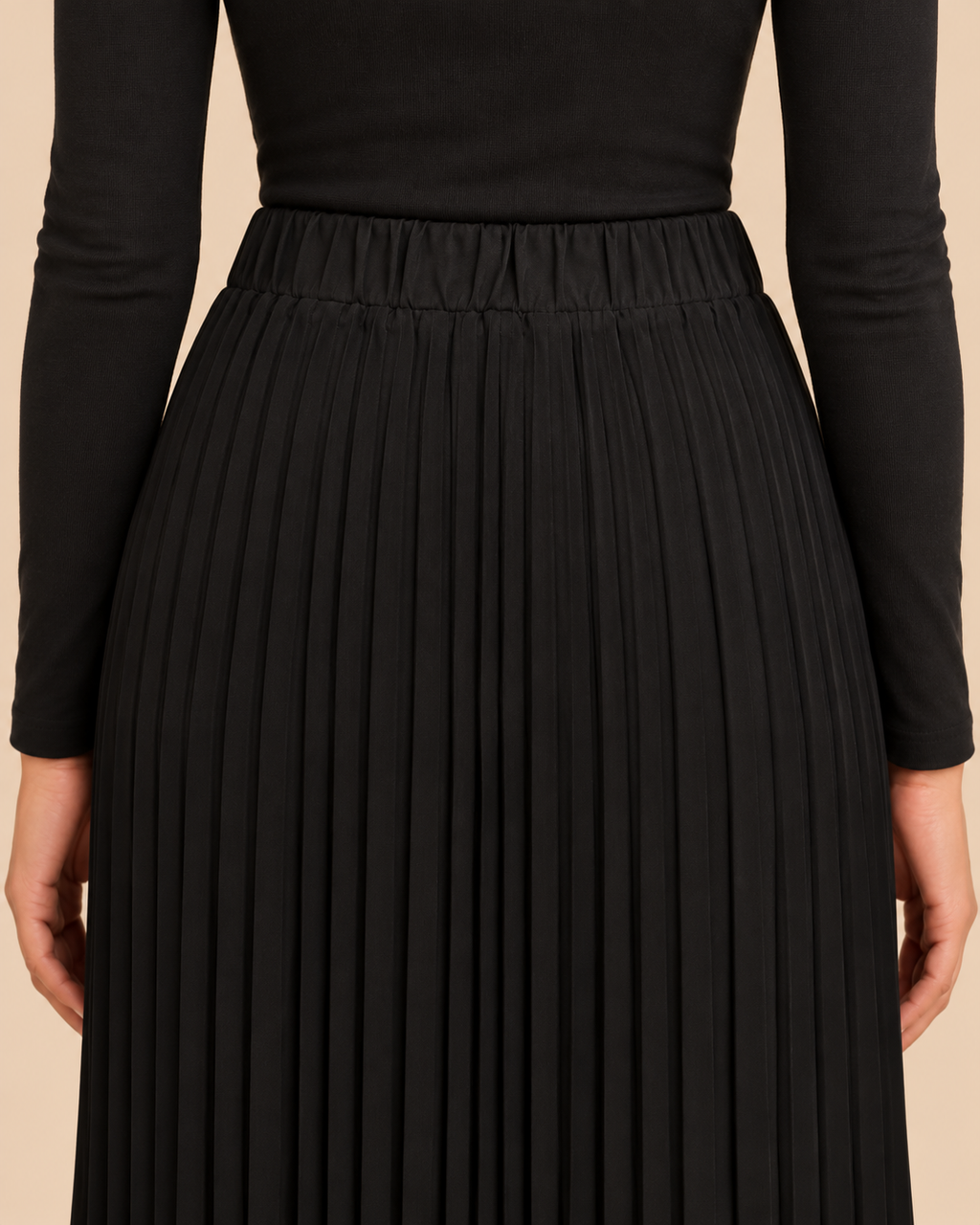 Black pleated skirt back waistband detail
