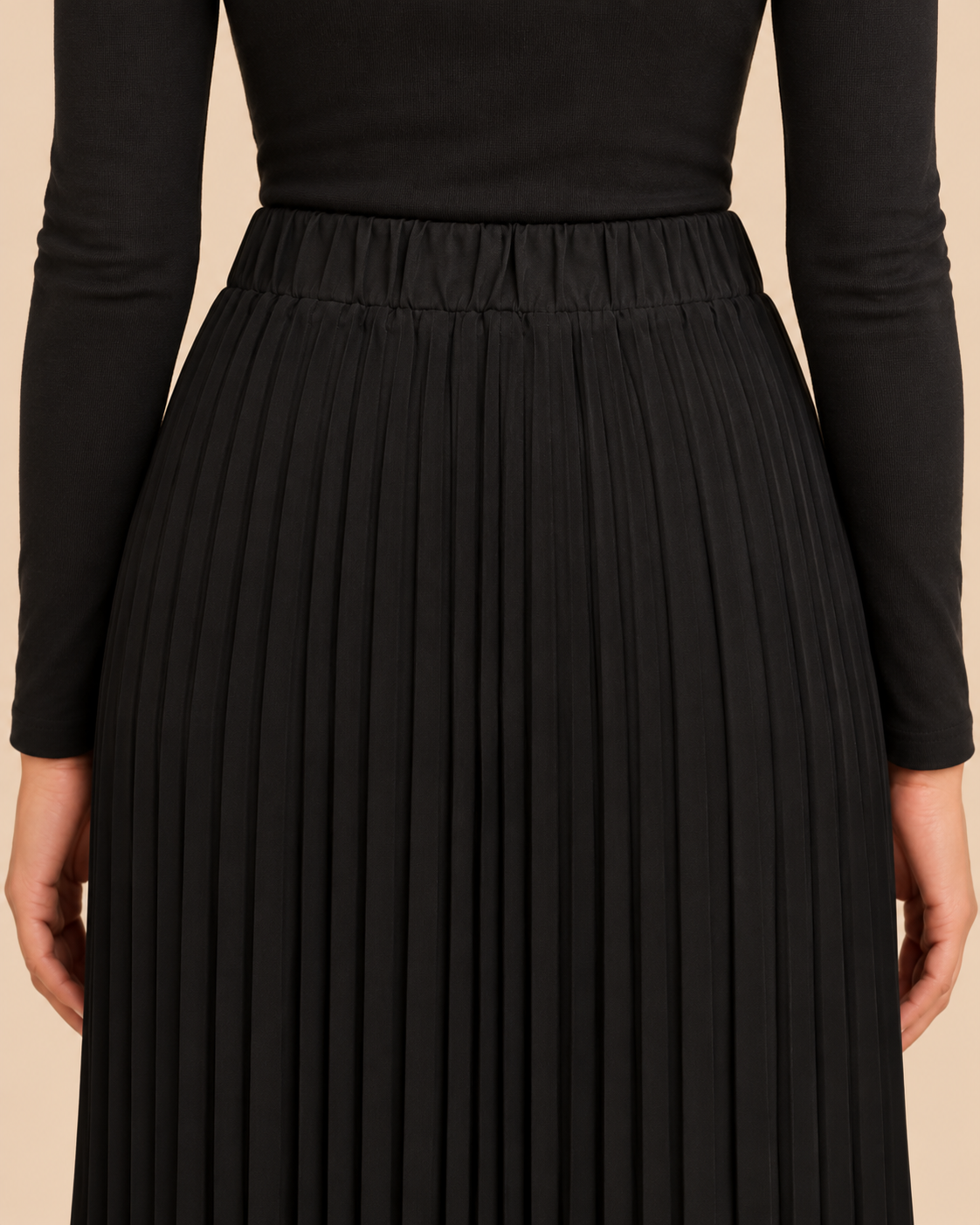 Black pleated skirt back waistband detail