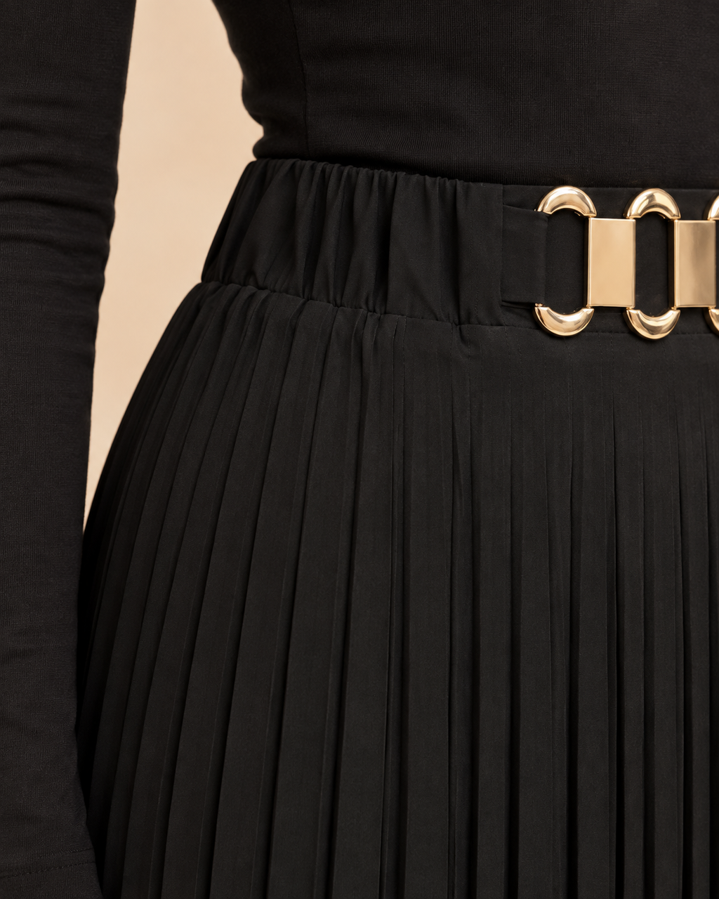 Black pleated skirt side waistband detail