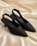 Black pointed-toe slingback heels front view