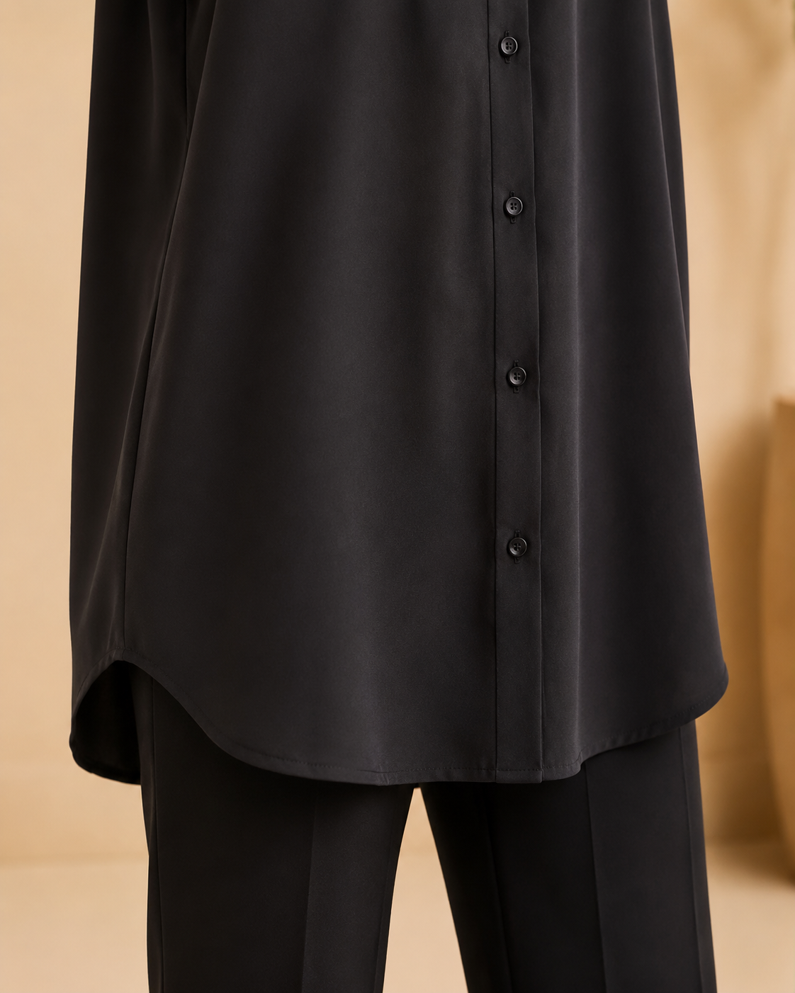 Black longline shirt hem detail
