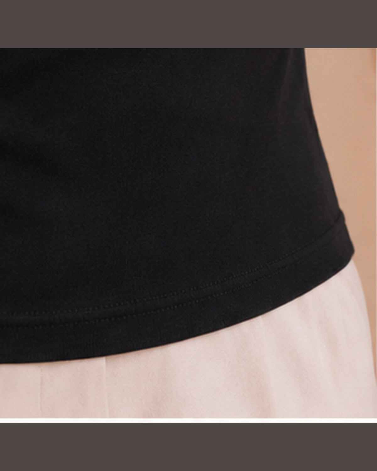 Black T-shirt bottom hem detail