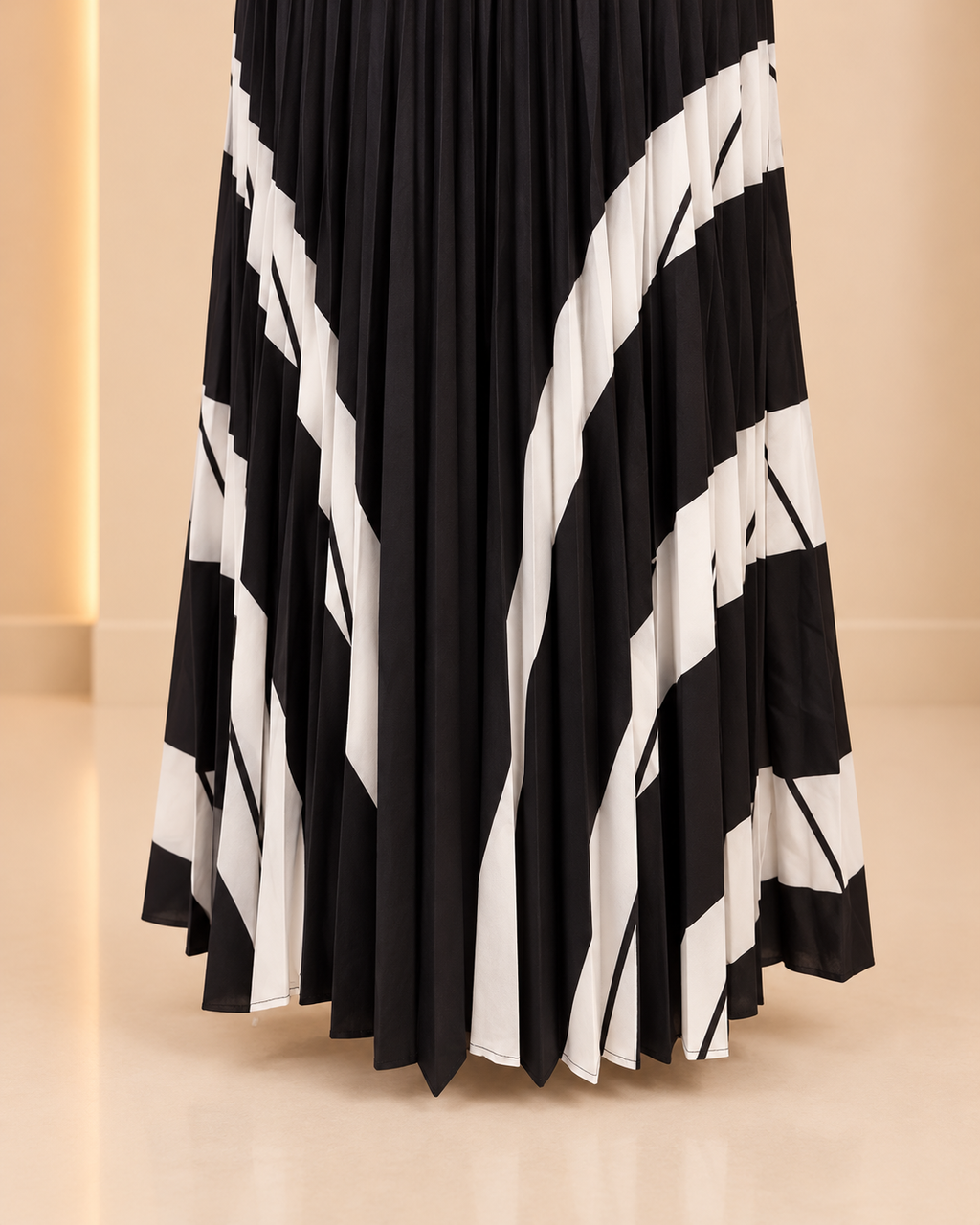 Monochrome Pleated Maxi Skirt hemline detail