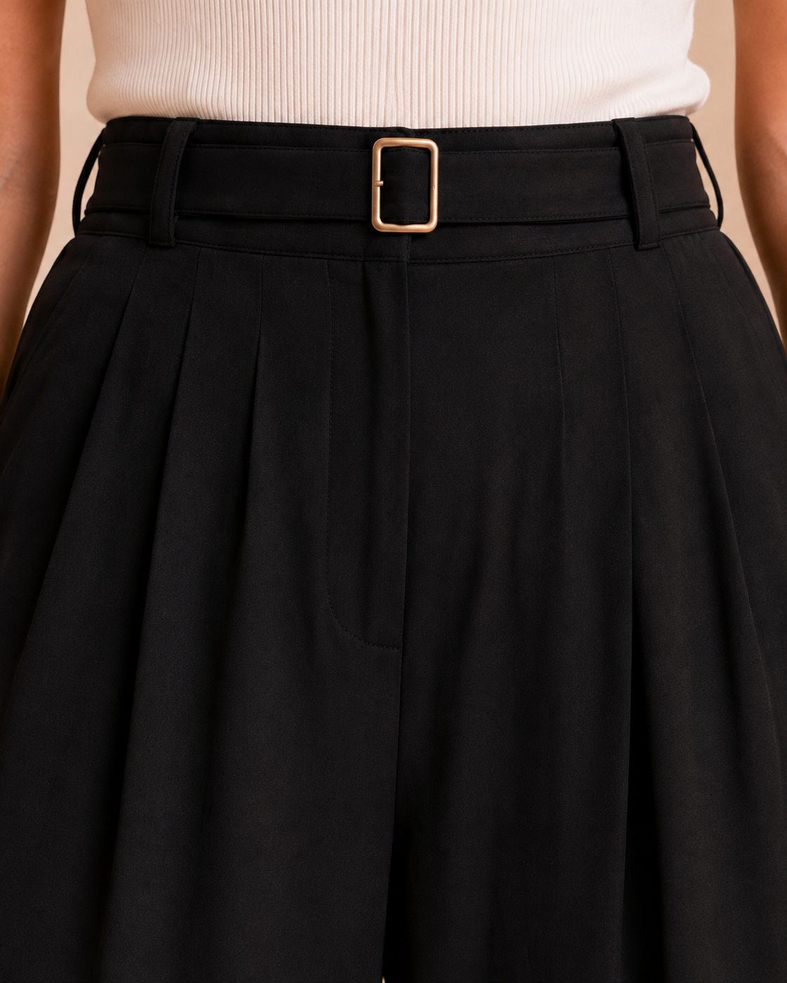 Black wide-leg pants waist and pleat detail