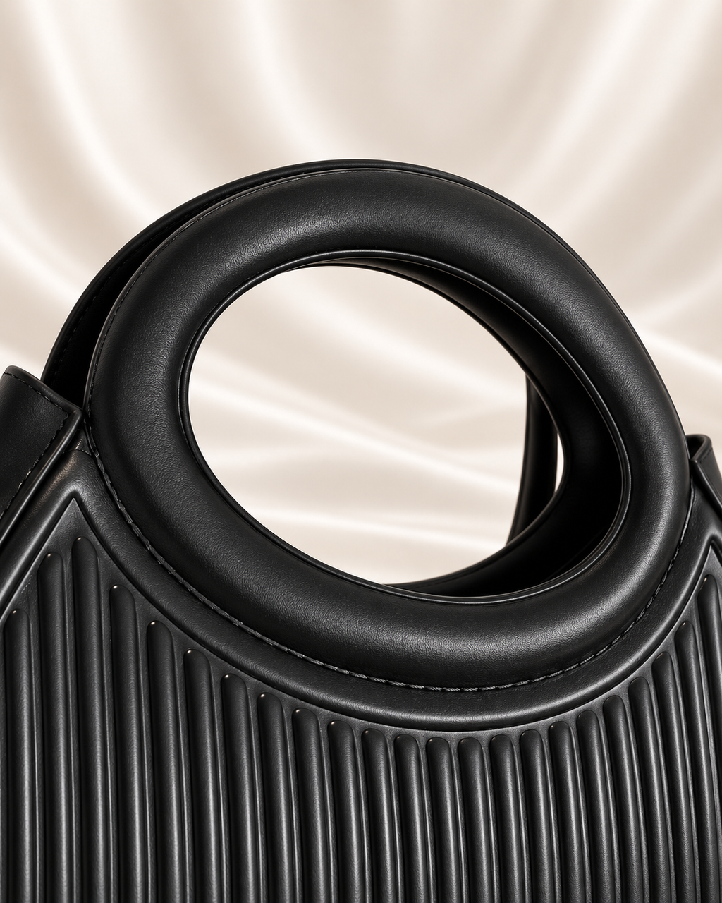 Integrated padded oval handle detail