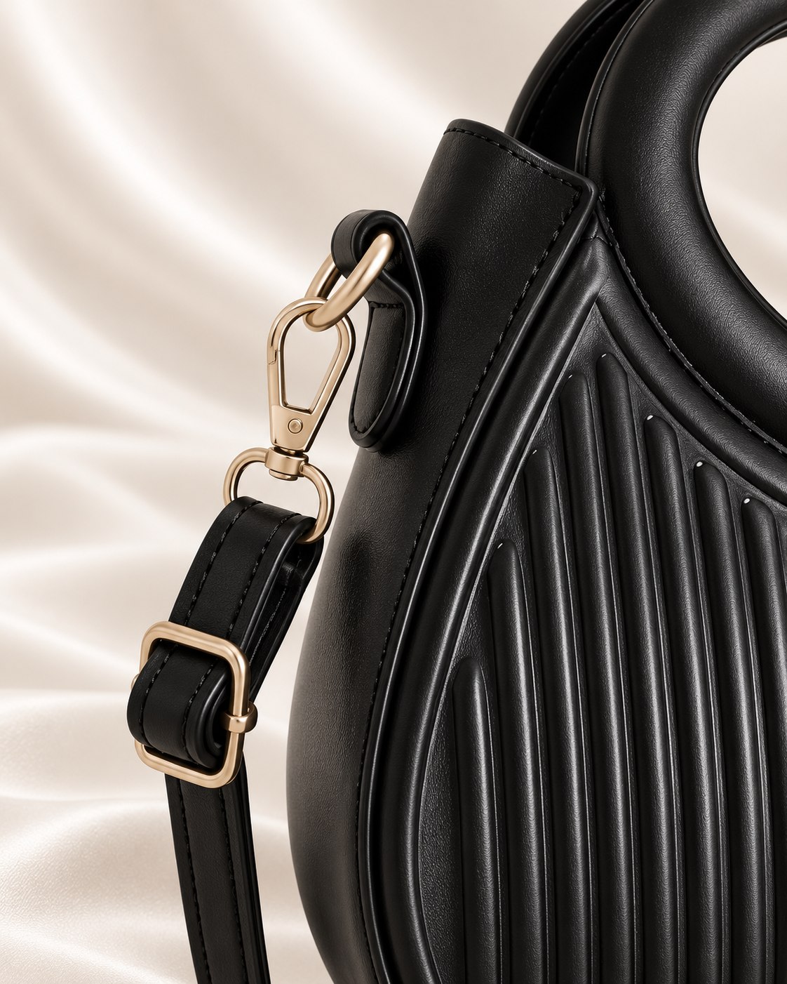Pale gold strap clasp and ring detail