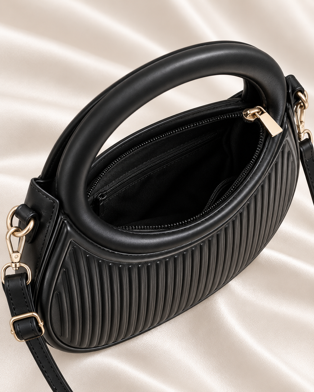 Gold zipper and black interior detail