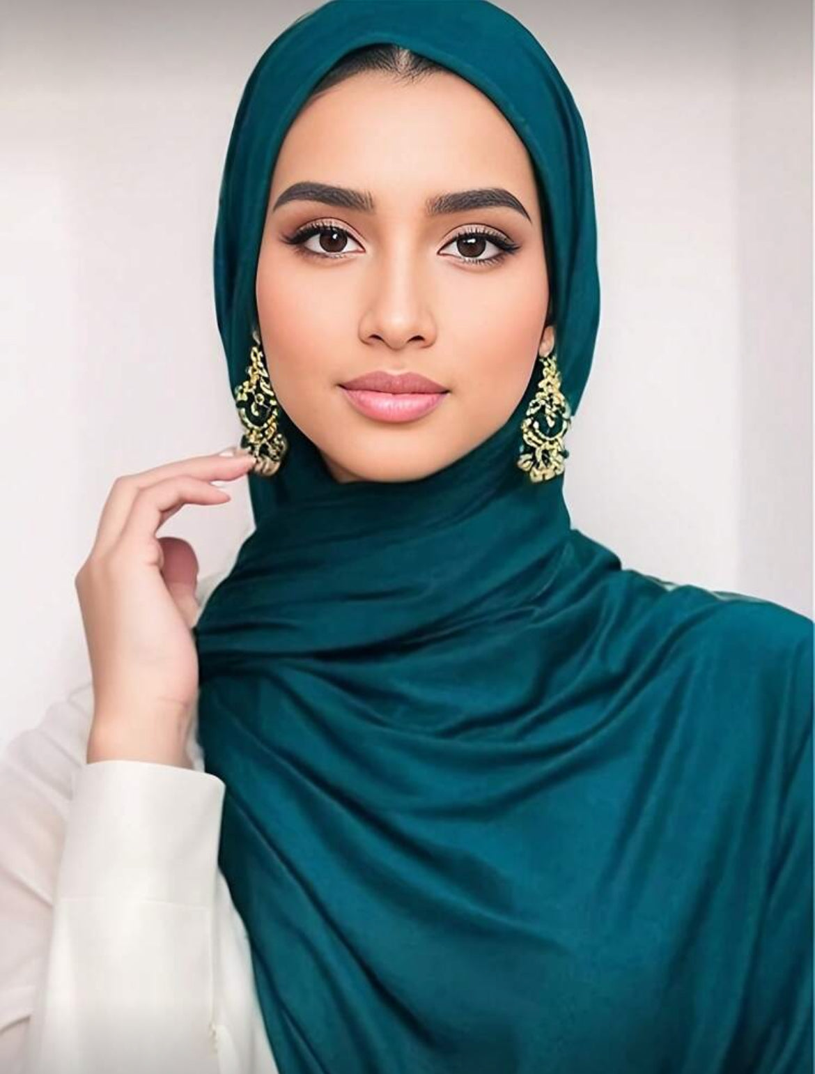 Teal chiffon hijab on model