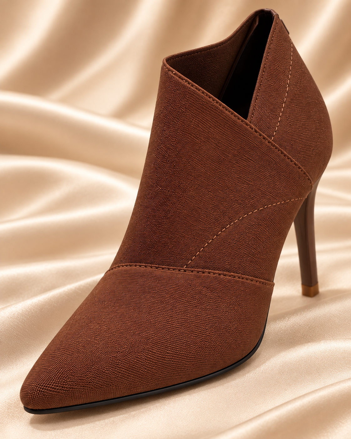 Brown ankle boot profile and opening detail