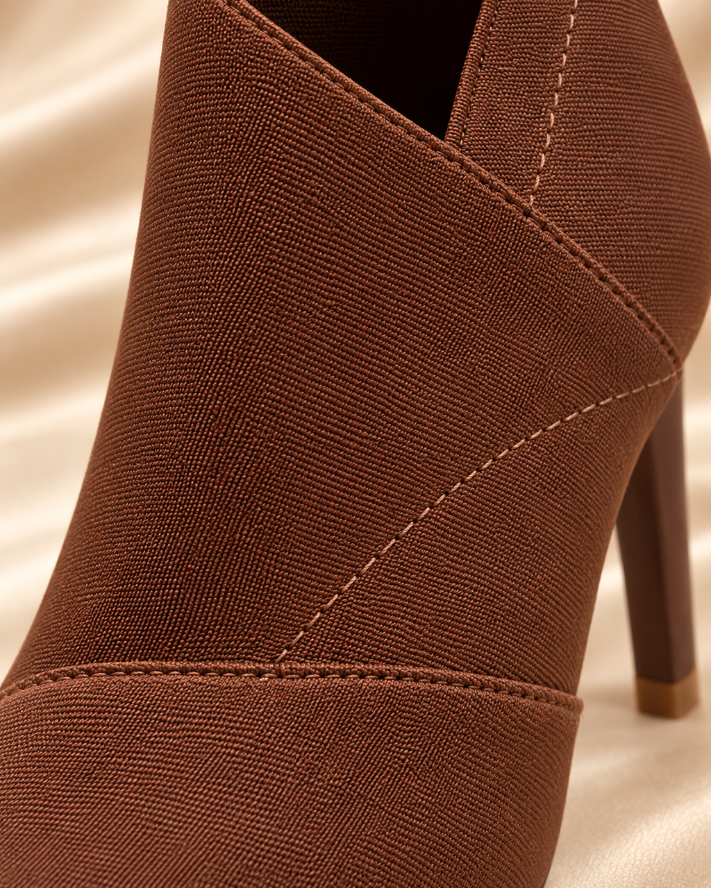 Brown ankle boot stitching and seam detail