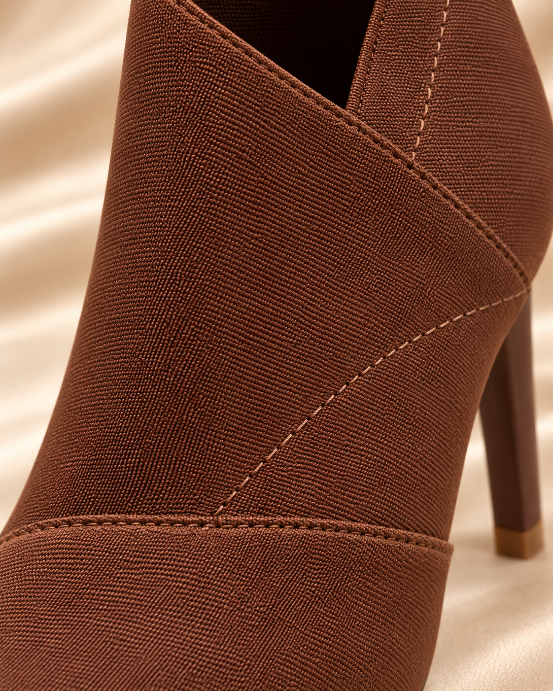 Brown ankle boot stitching and seam detail