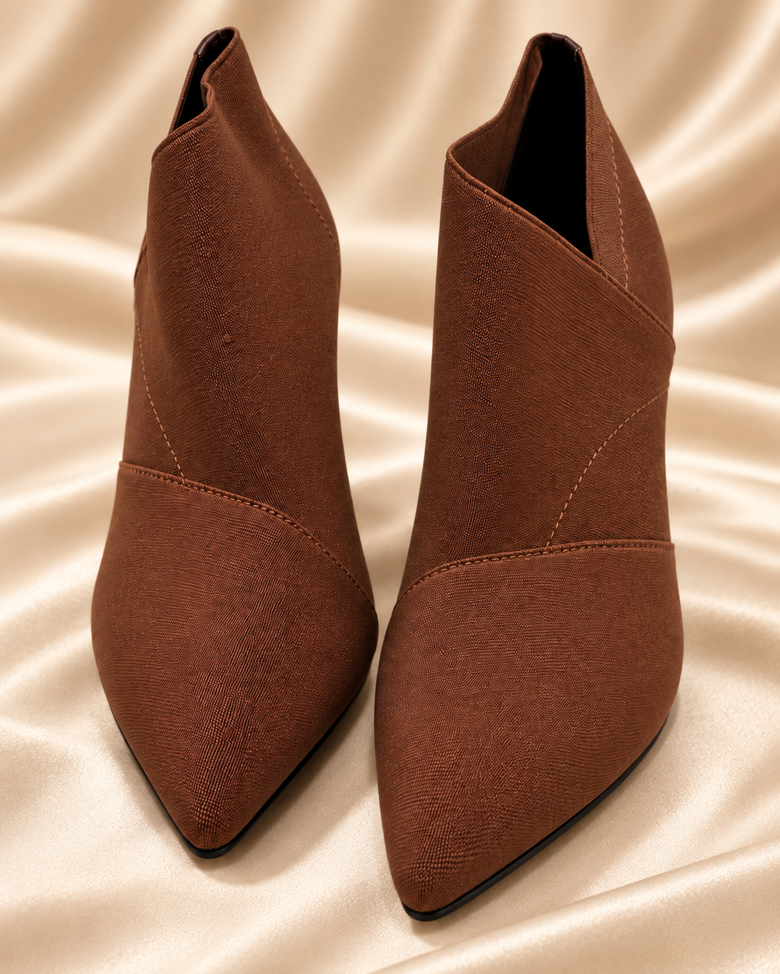Brown ankle boots front construction detail