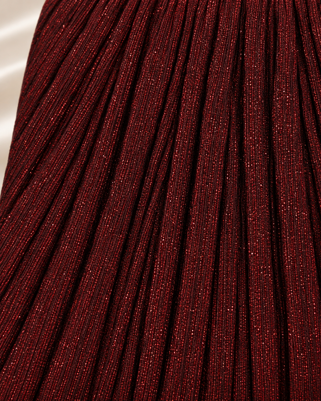 Burgundy pleated glitter fabric detail