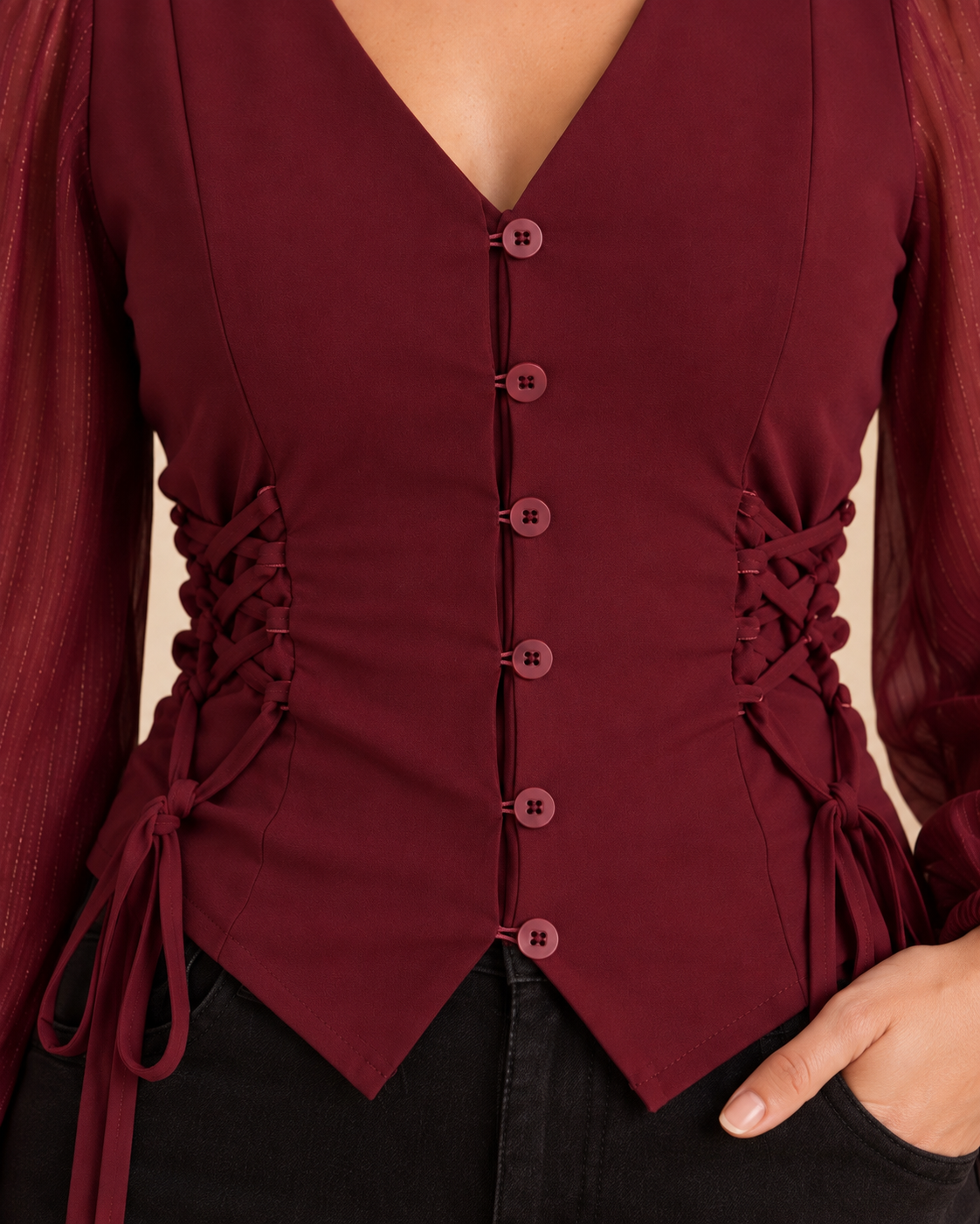 Burgundy blouse front button loop closure and side lacing detail