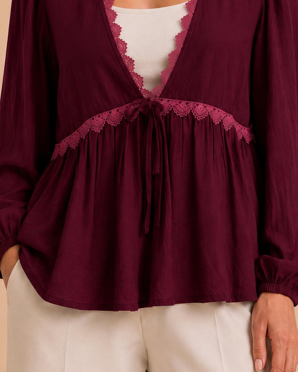 Burgundy blouse front tie and lace band detail
