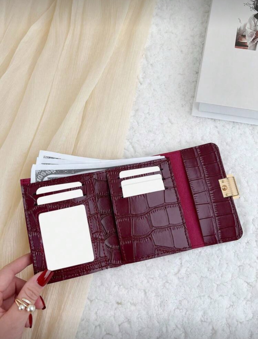 Burgundy crocodile texture compact wallet interior with card slots
