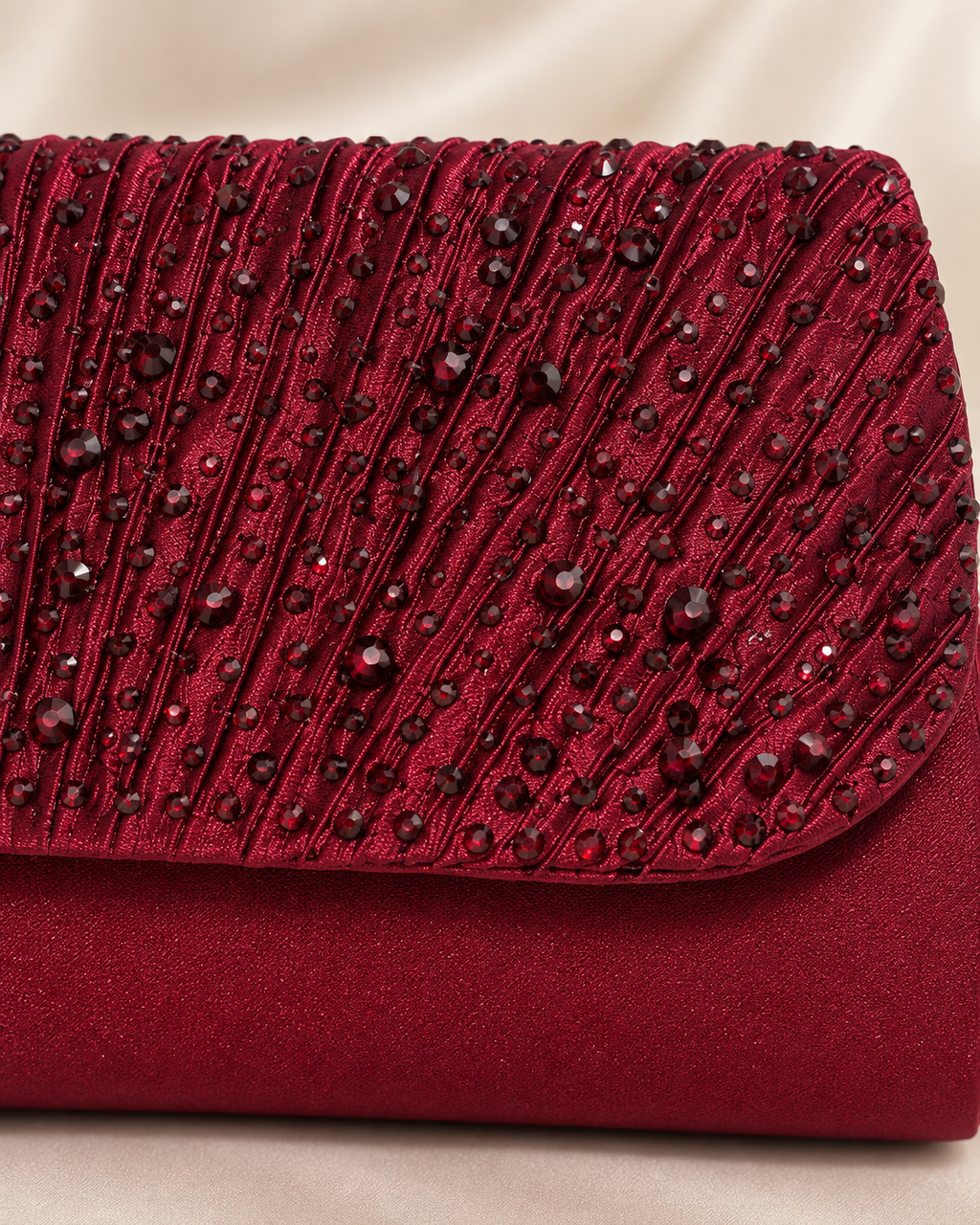 Burgundy embellished bag front flap detail