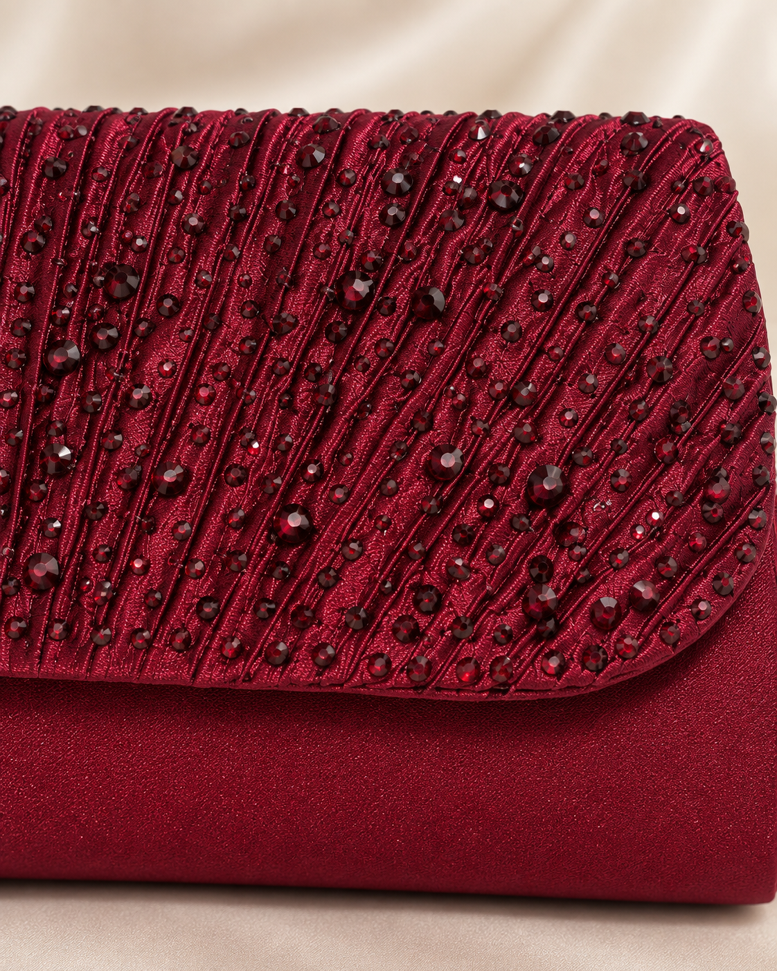 Burgundy embellished bag front flap detail