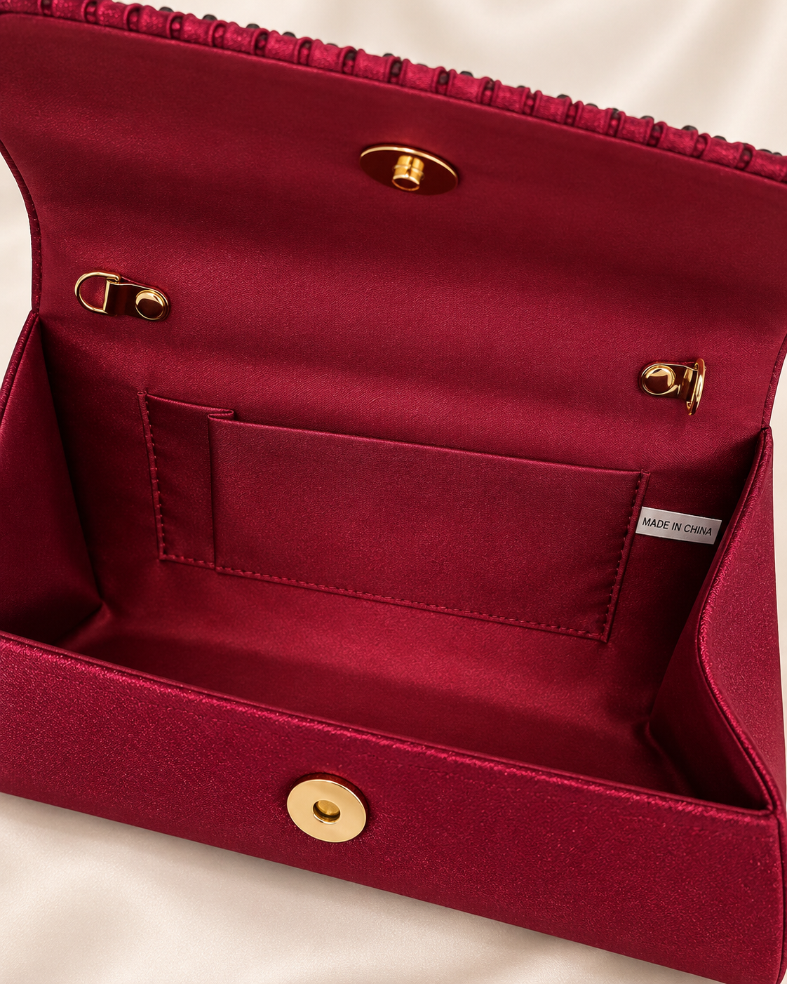 Interior pocket and gold hardware detail