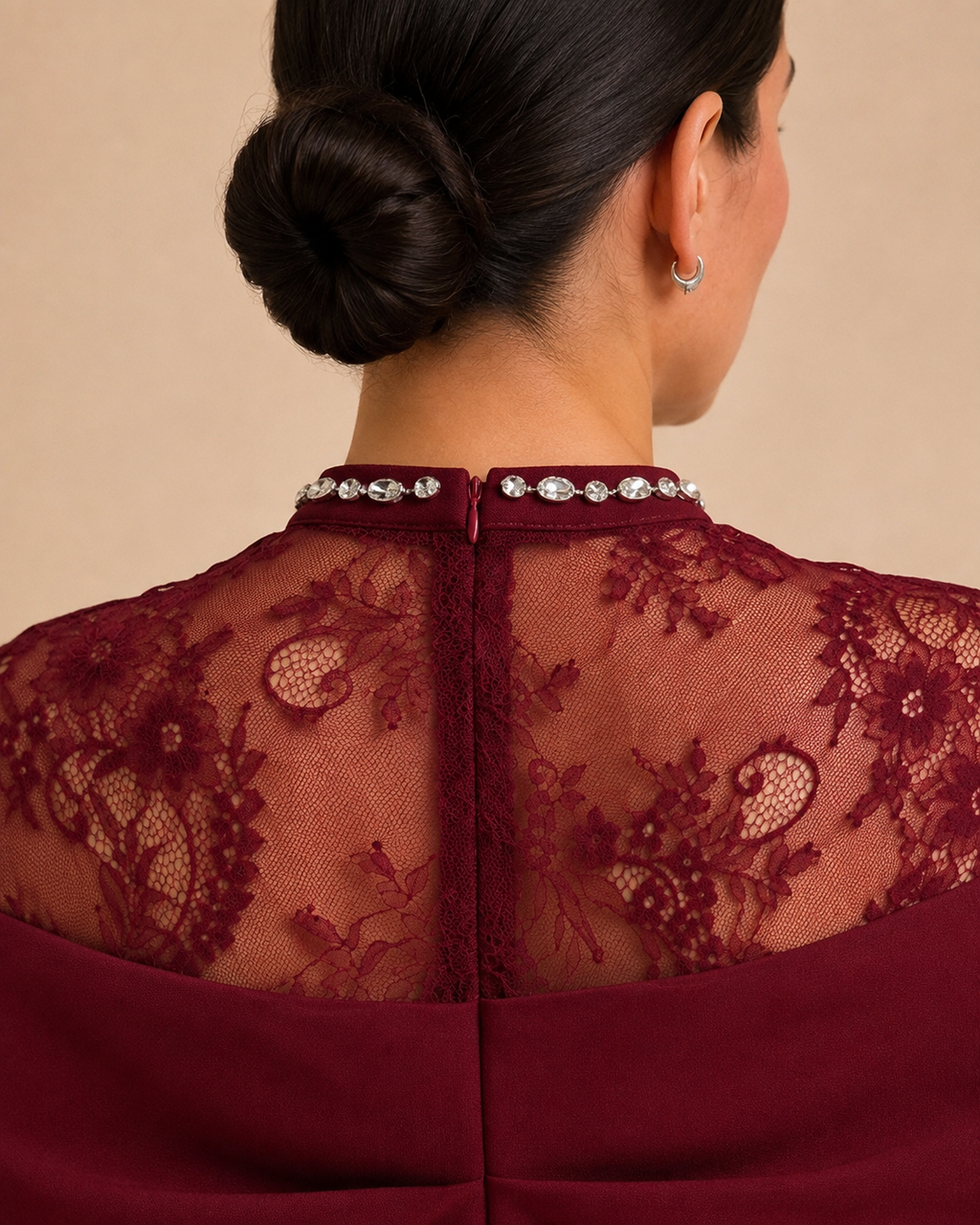 Burgundy lace jumpsuit back neckline and zipper detail
