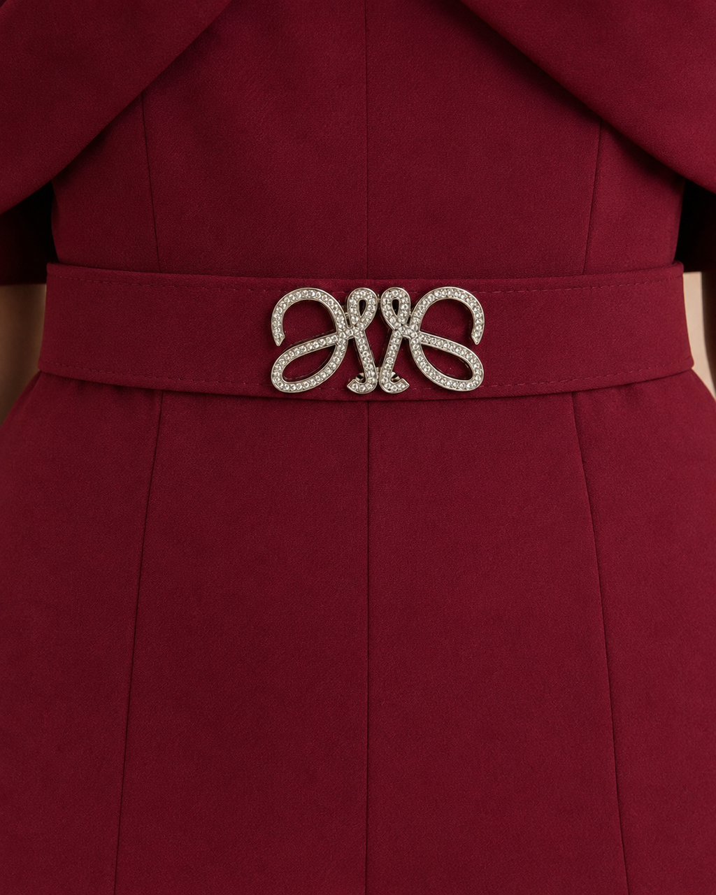 Burgundy jumpsuit crystal belt buckle detail