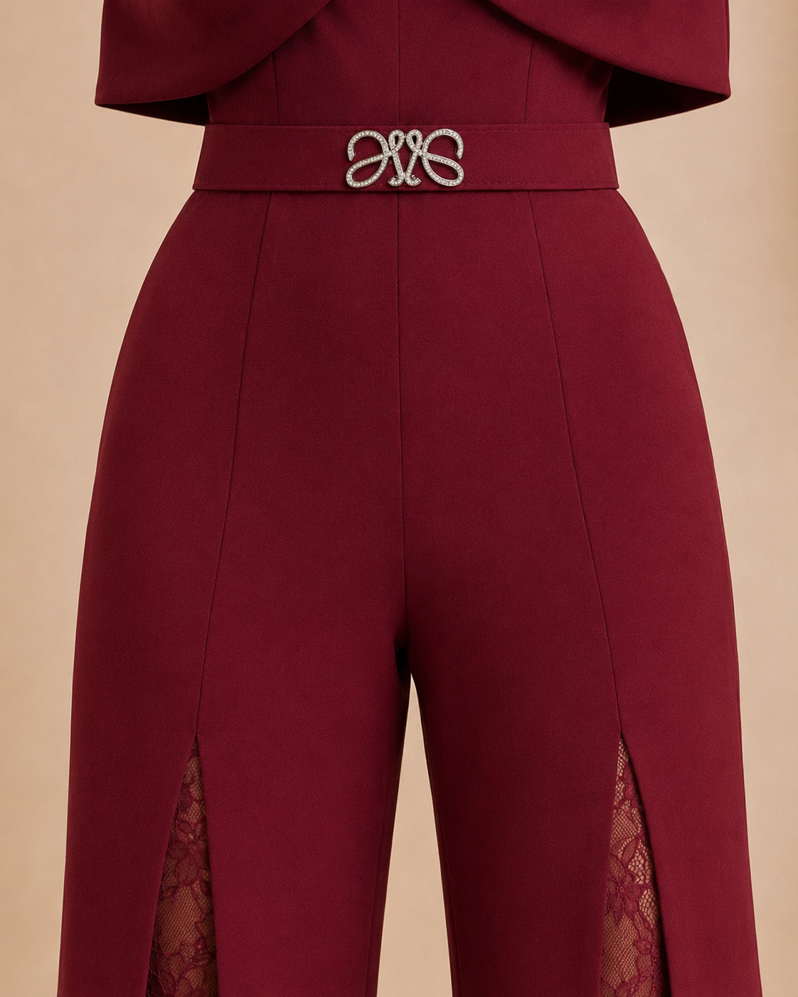 Burgundy jumpsuit front trouser seam and lace insert detail