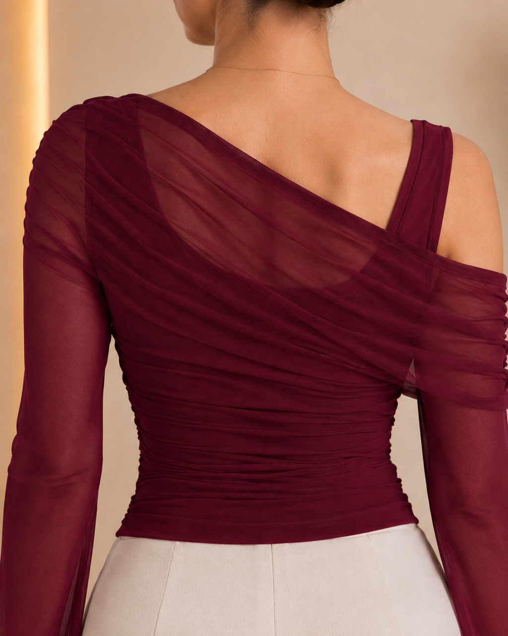 Back neckline and ruched panel detail