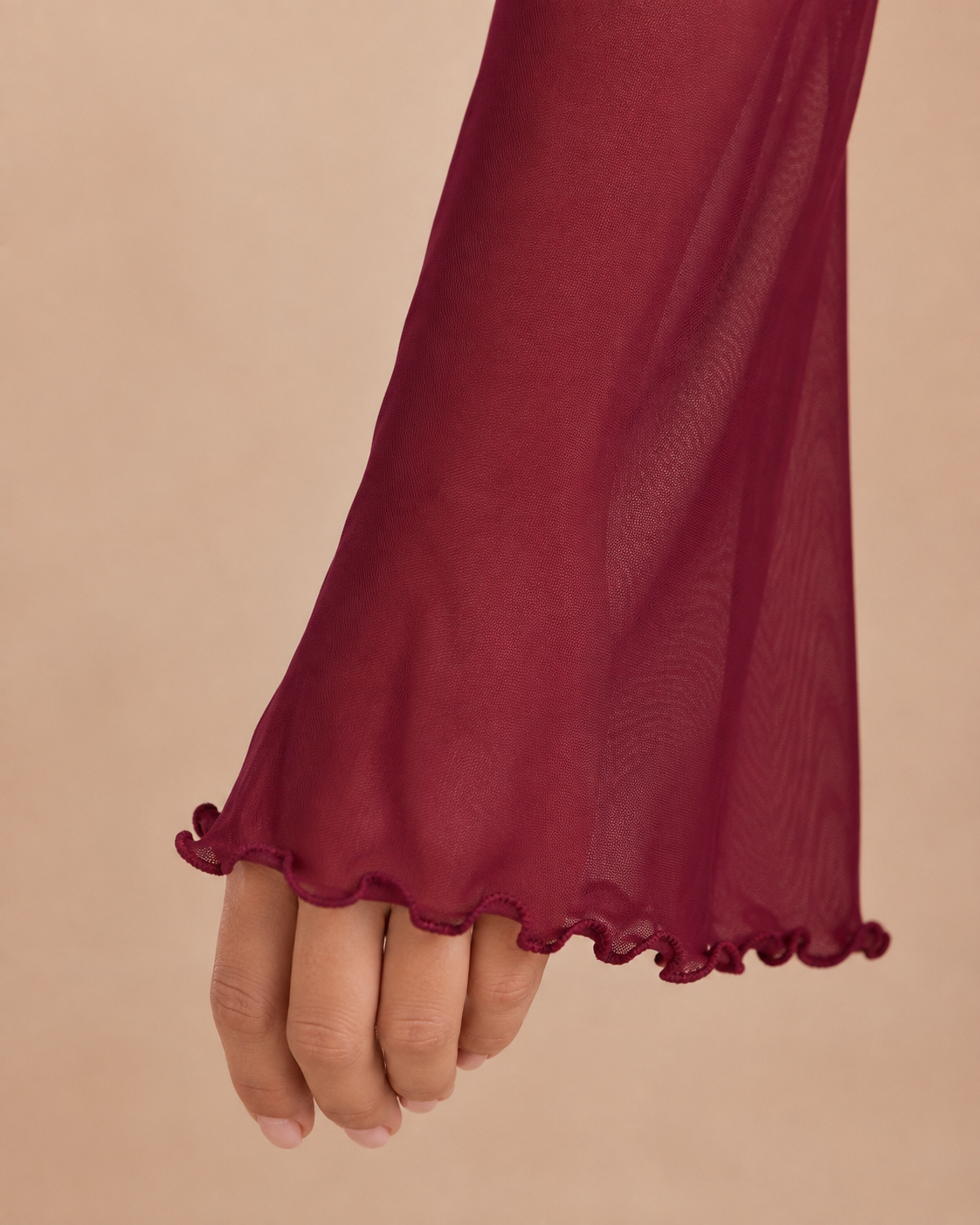 Ruffled sleeve cuff detail