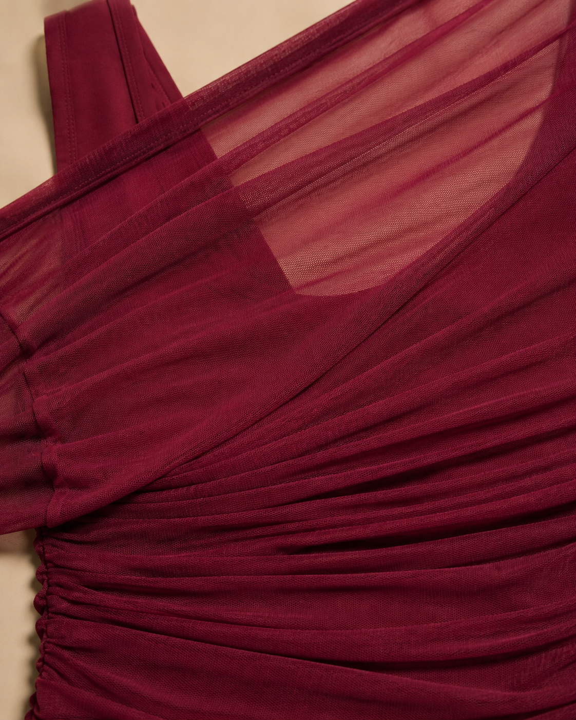Sheer mesh draping and ruching detail