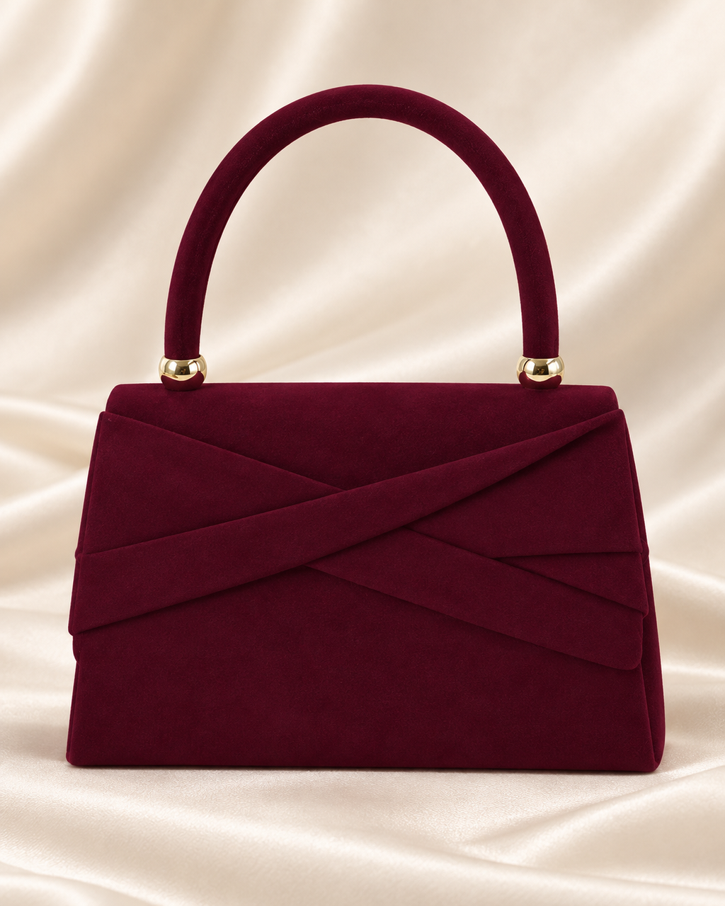 Burgundy velvet structured handbag front view